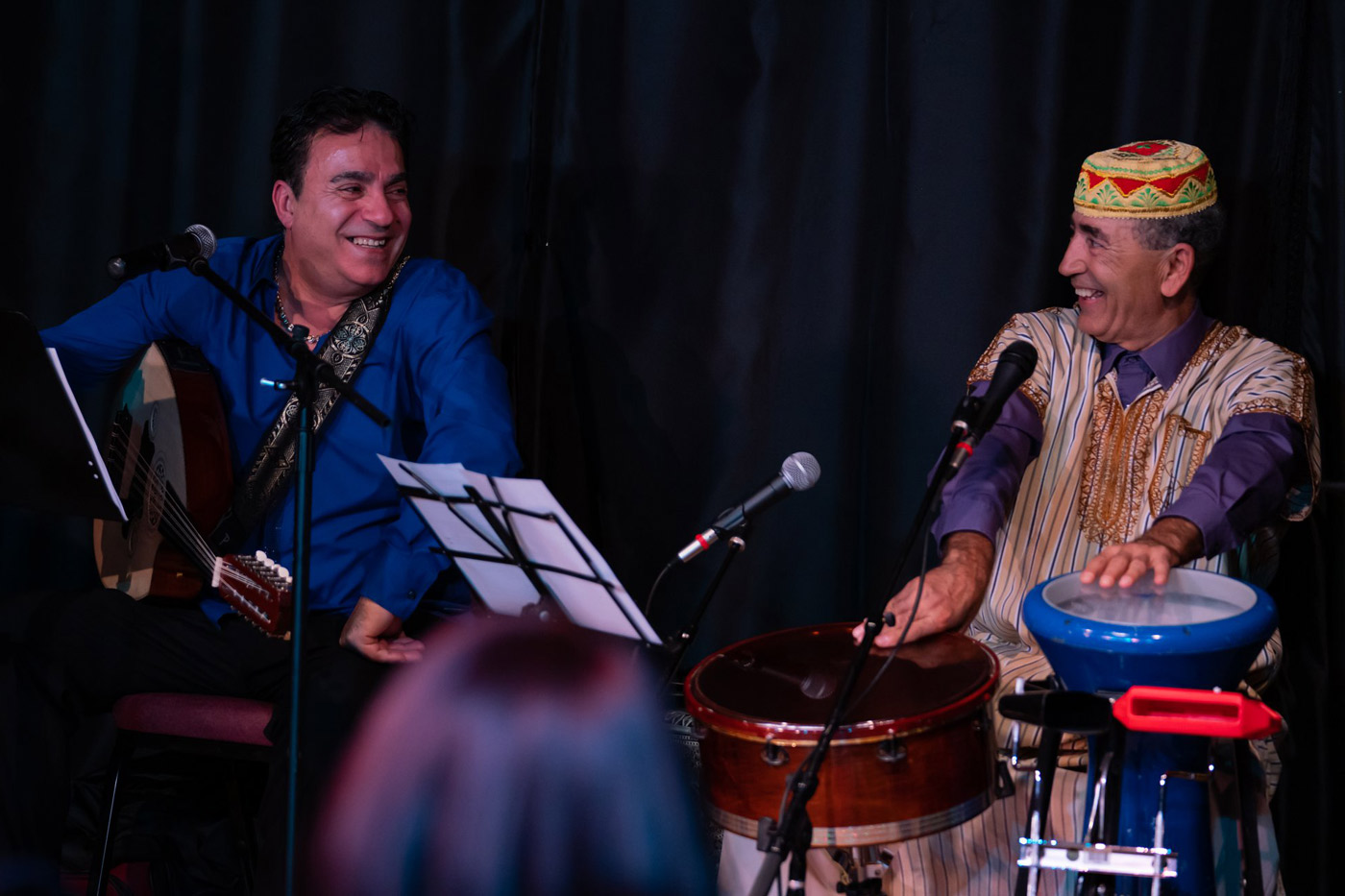 george maalouf performing on stage with drummer
